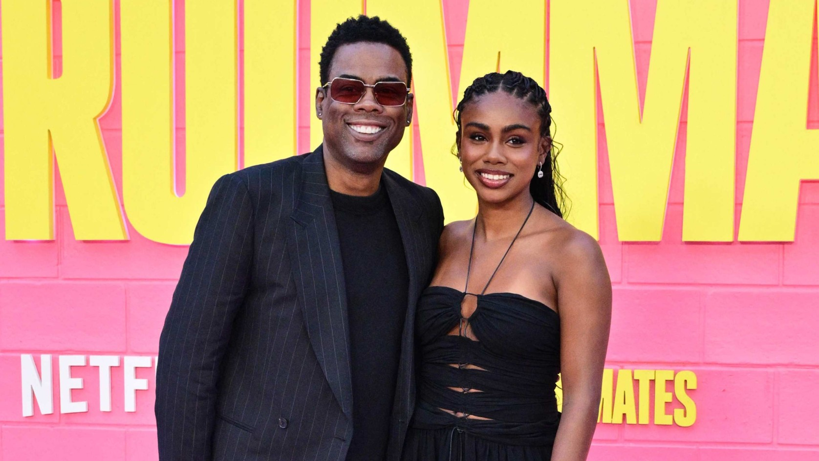 Chris Rock y su hija Zahra Rock. Foto: AFP